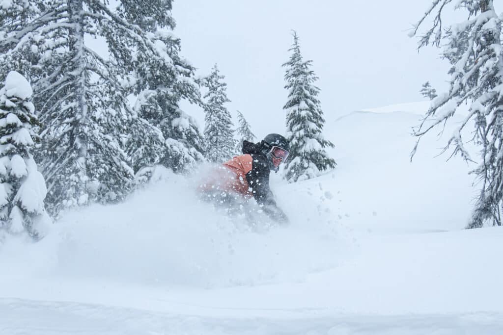 Snowboarder in deep powder at Willamette Pass ski resort